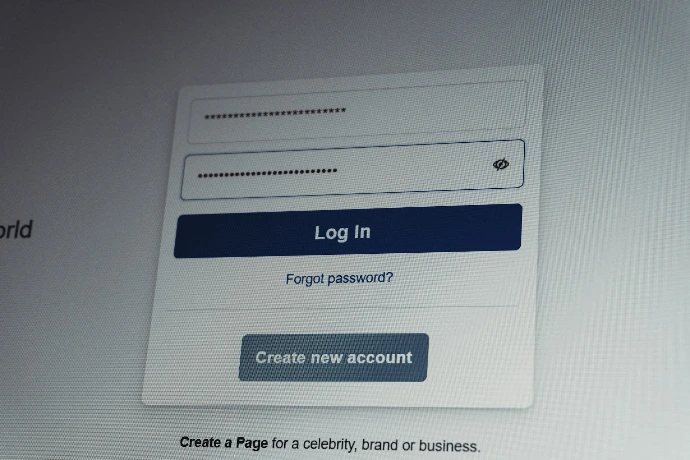 Facebook login screen with username and password fields.